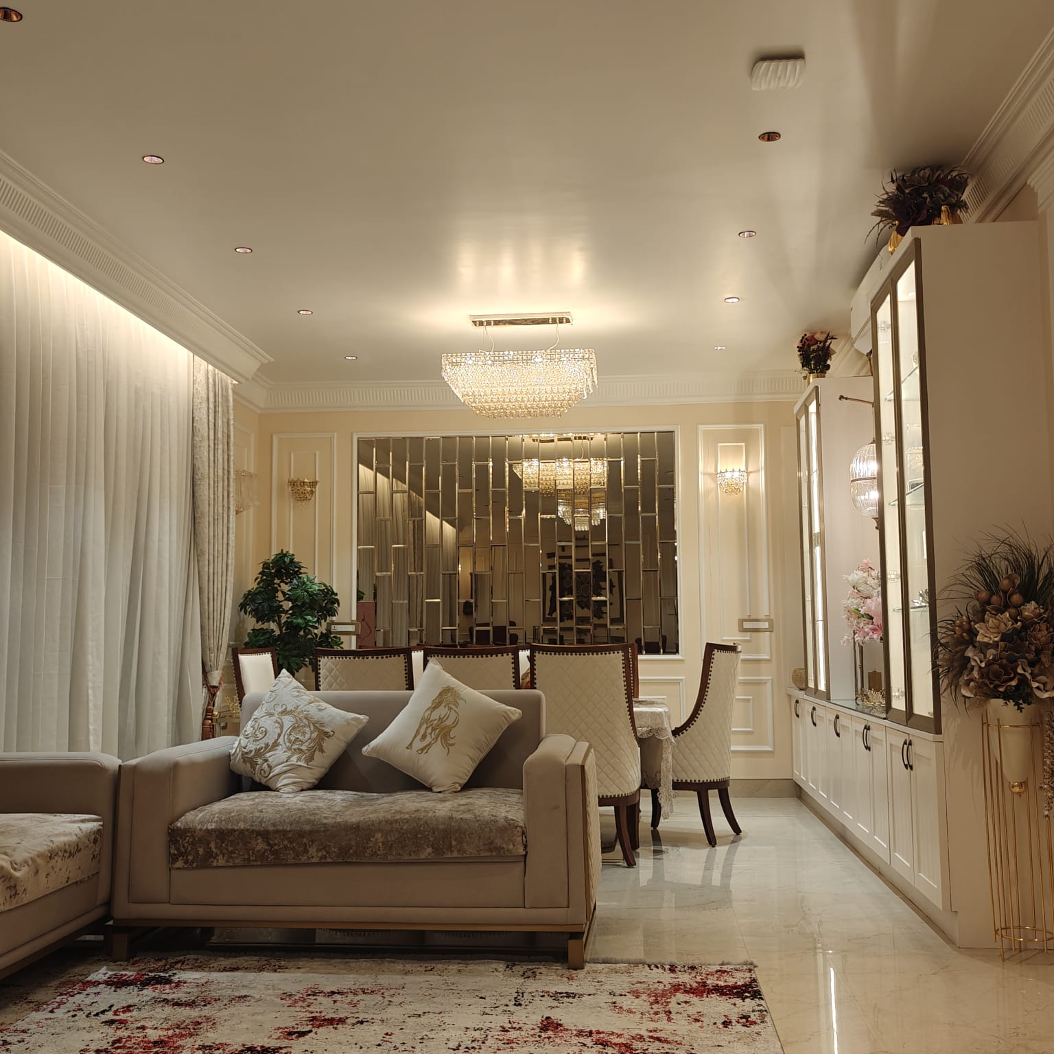 Luxury living room with crystal chandelier — INKA interior project Bangalore